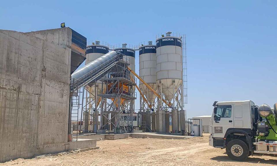 MEKA K160 Stationary Concrete Batching Plant silos and mixer truck in Libya
